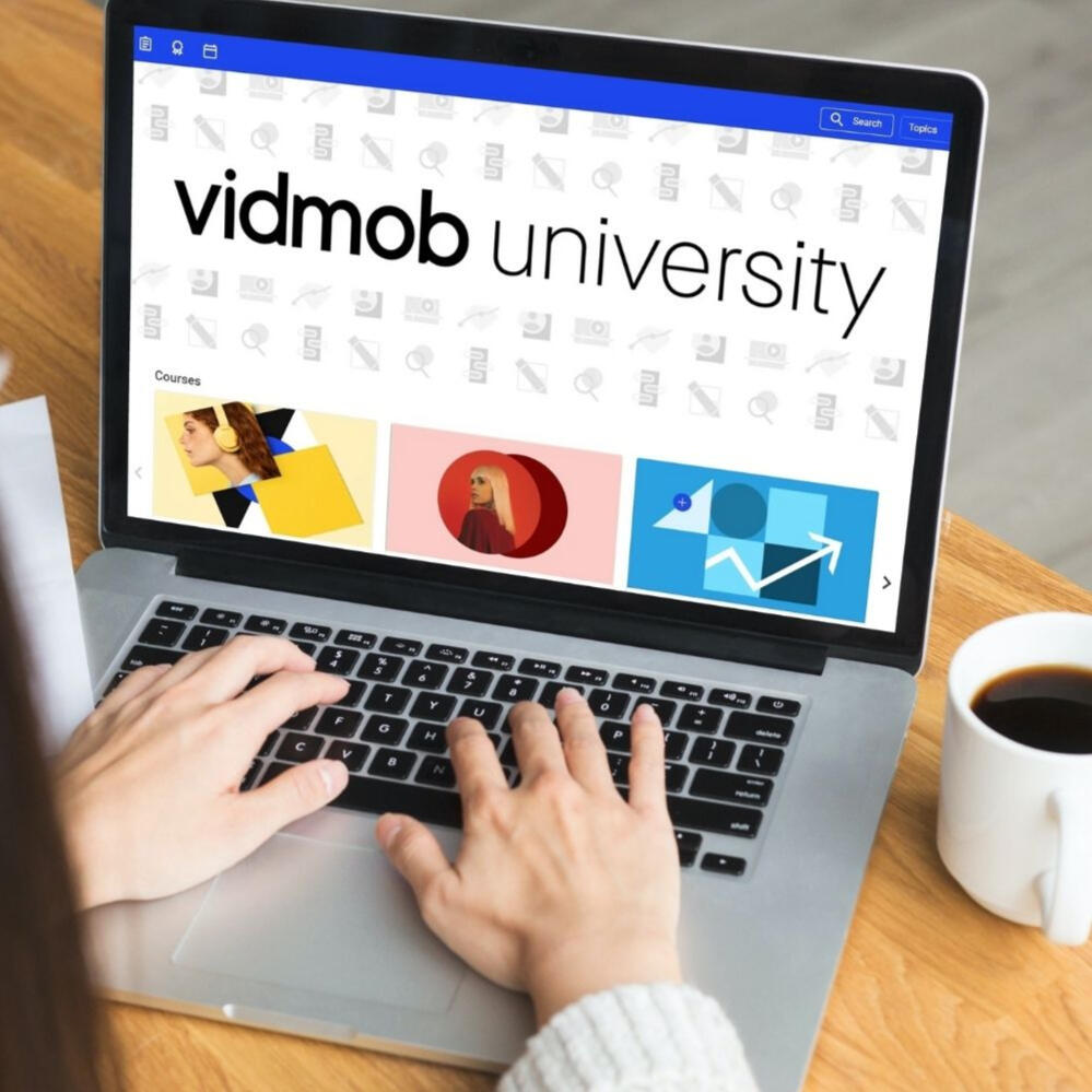 Laptop screen with Vidmob University homepage
